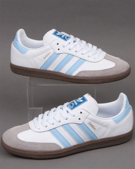 white sneakers with blue stripe